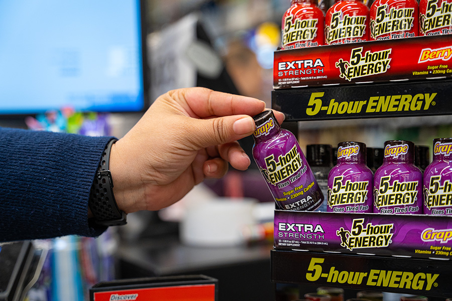 person choosing 5-hour Energy shot